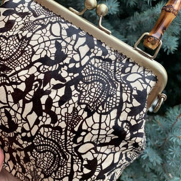 Handmade Real hair-on-horsehide Black Lace Printed Metal Frame Bamboo Handle Bag - Picture 13 of 16